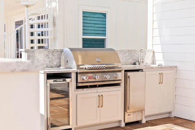 a bedroom with a large bed and a large window