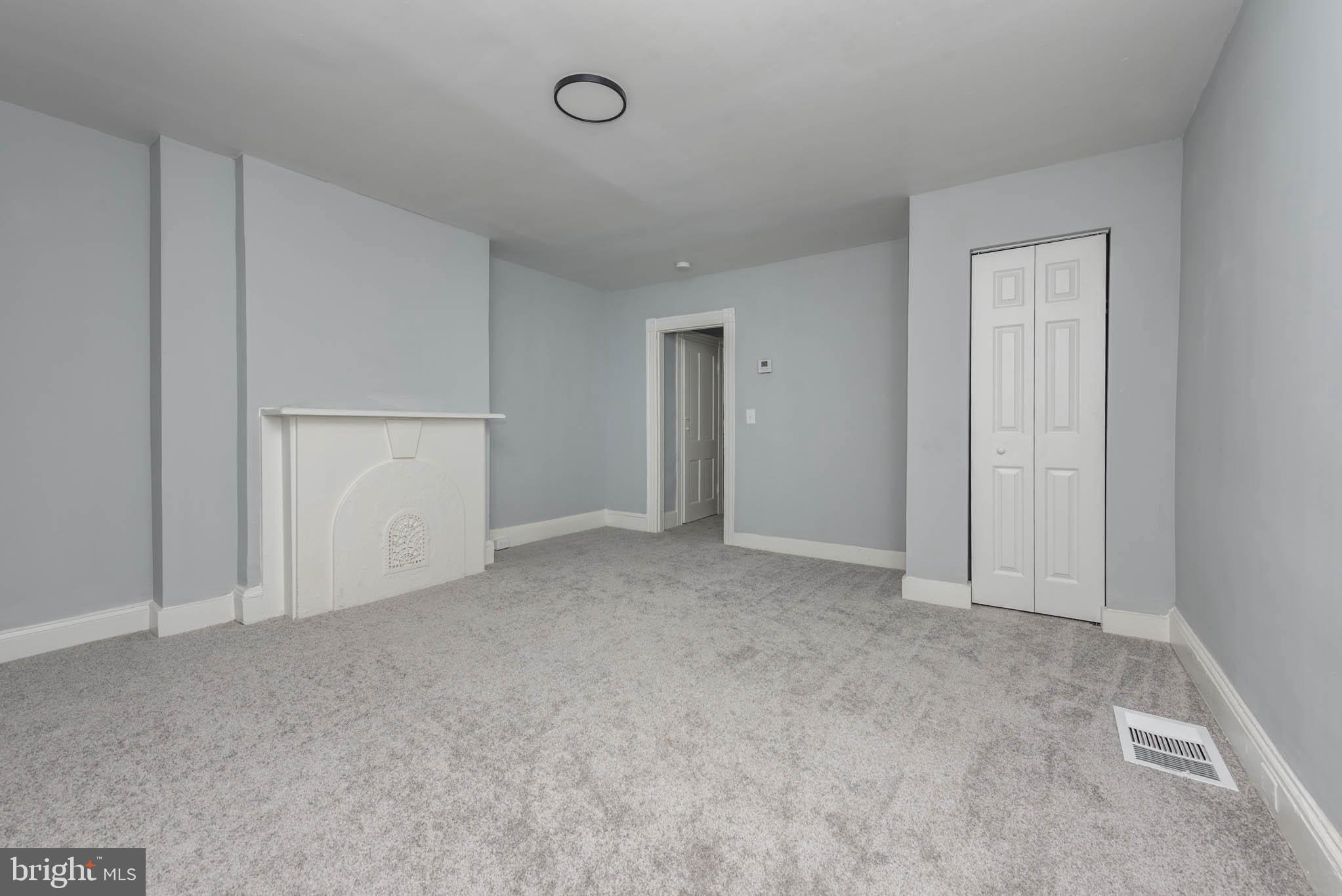 1909 Harlem Avenue Baltimore, MD 21217 - Photo 5 of 27 a view of an empty room