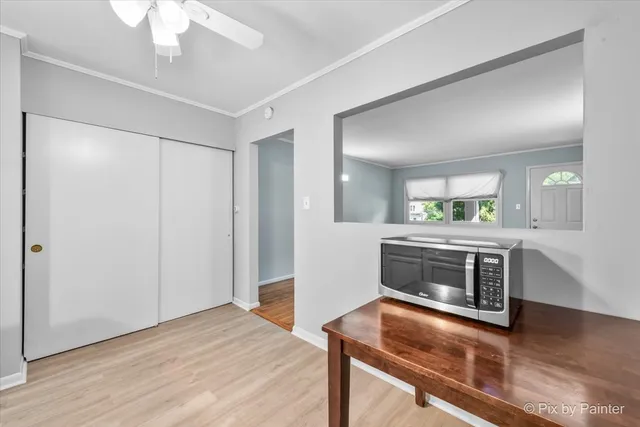 a kitchen with a stove and a microwave
