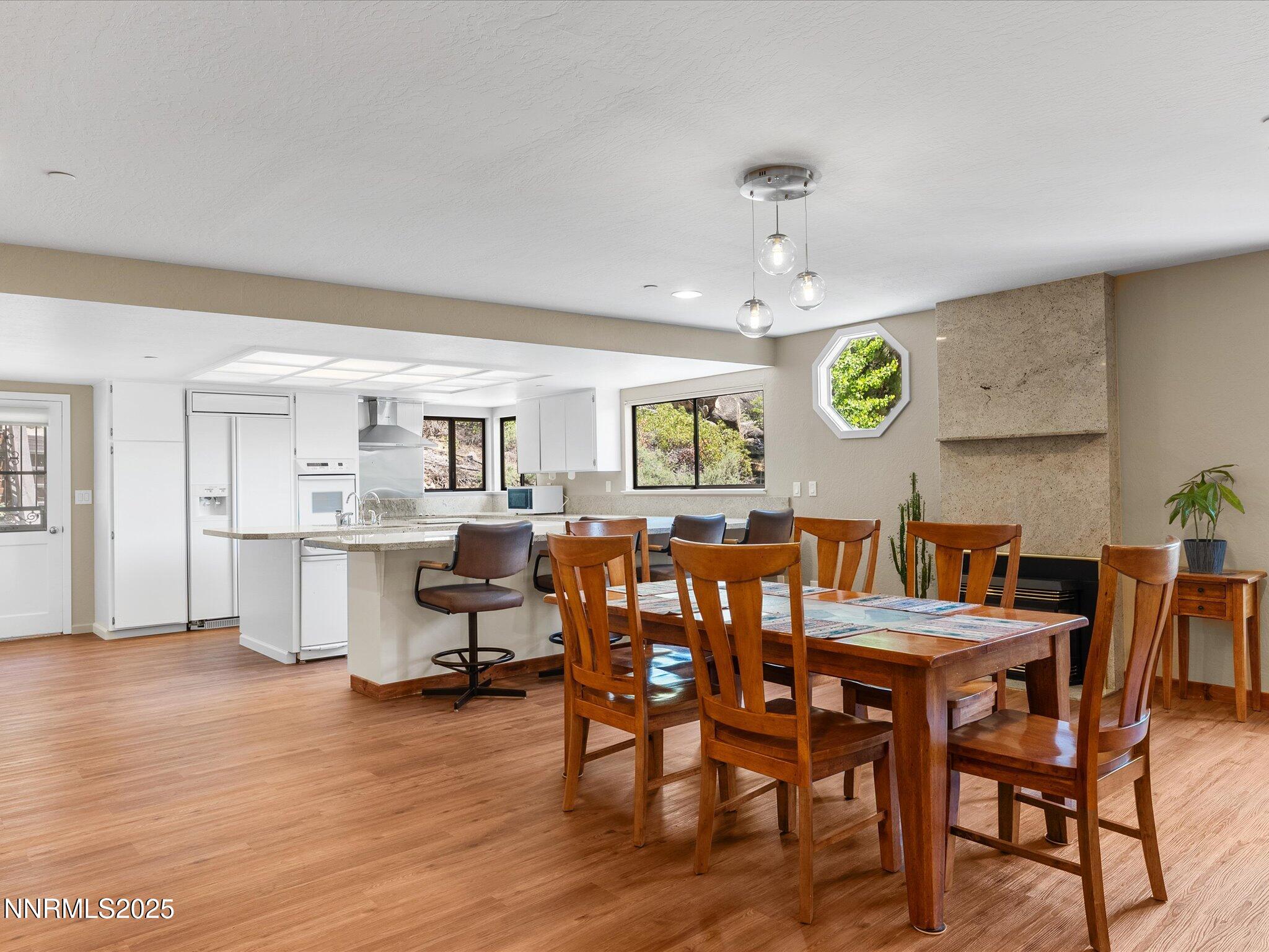 315 Paiute Drive Stateline, NV 89449 - Photo 11 of 77 a view of a dining room with furniture and wooden floor