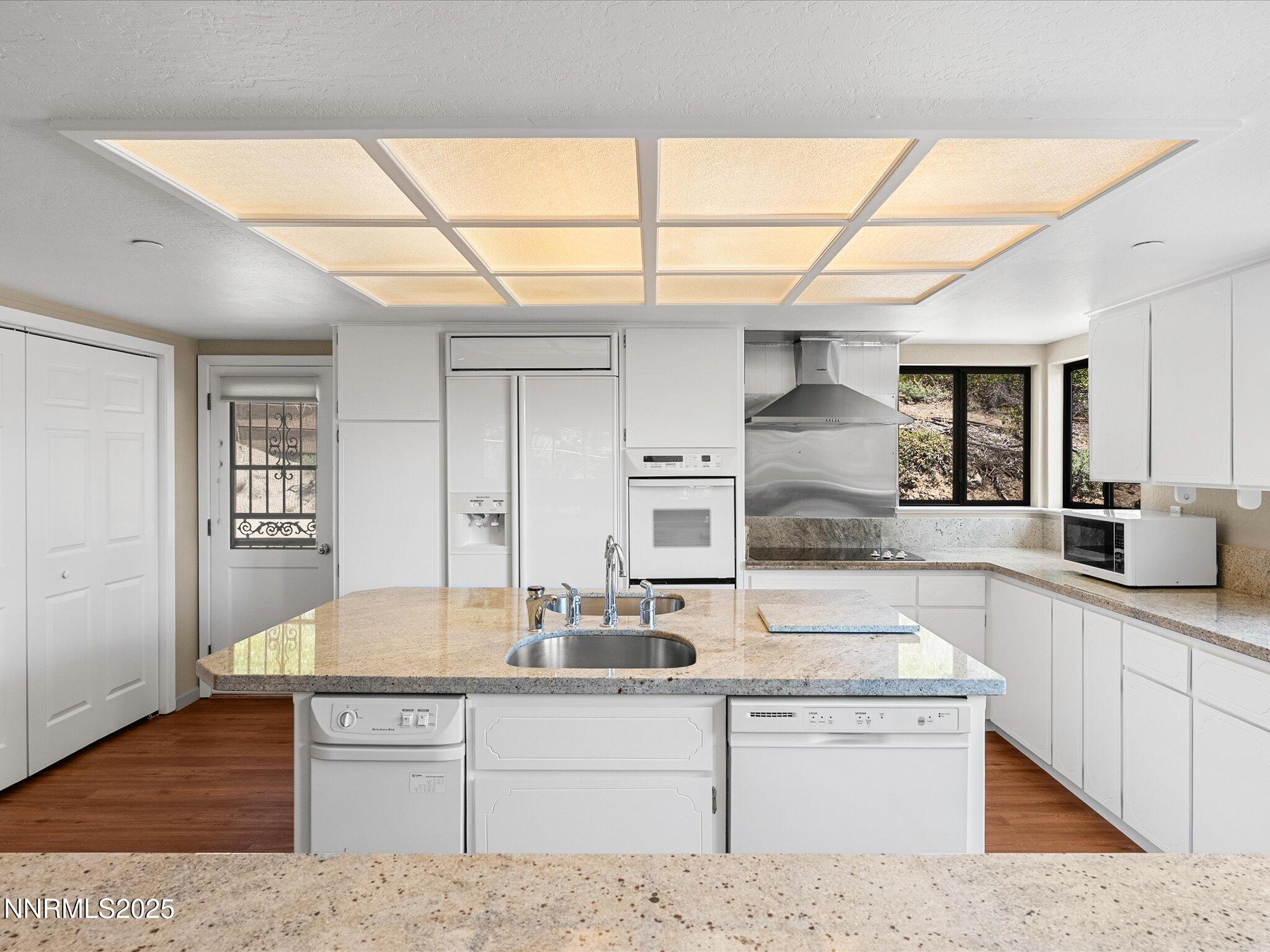 315 Paiute Drive Stateline, NV 89449 - Photo 17 of 77 a large kitchen with kitchen island a sink stainless steel appliances and cabinets