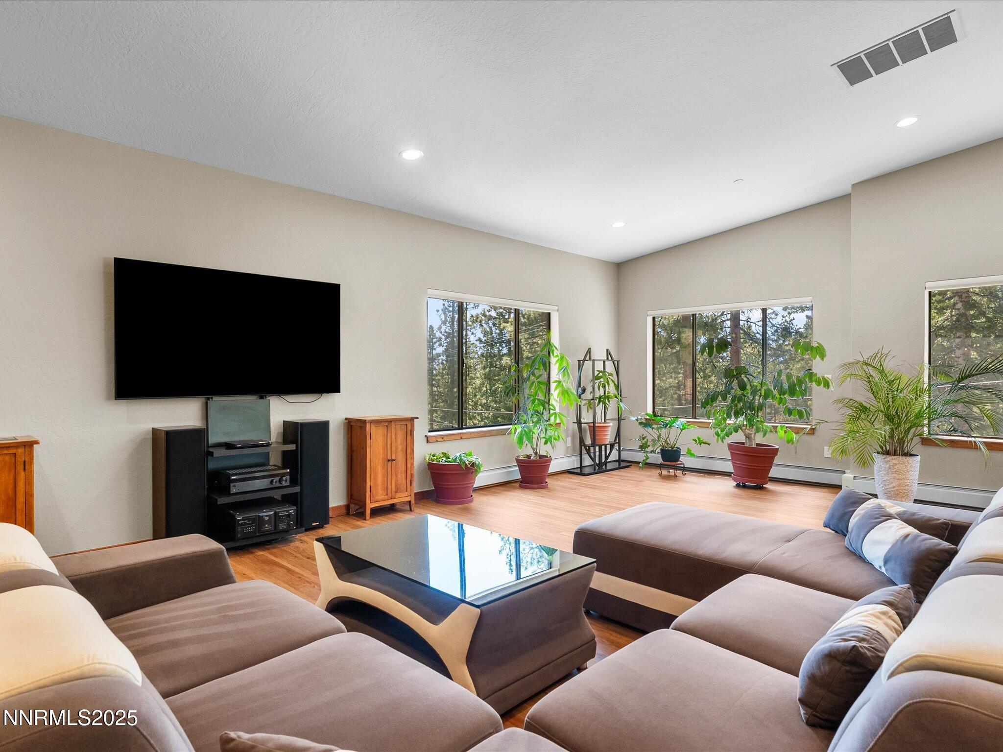 315 Paiute Drive Stateline, NV 89449 - Photo 4 of 77 a living room with furniture and a flat screen tv