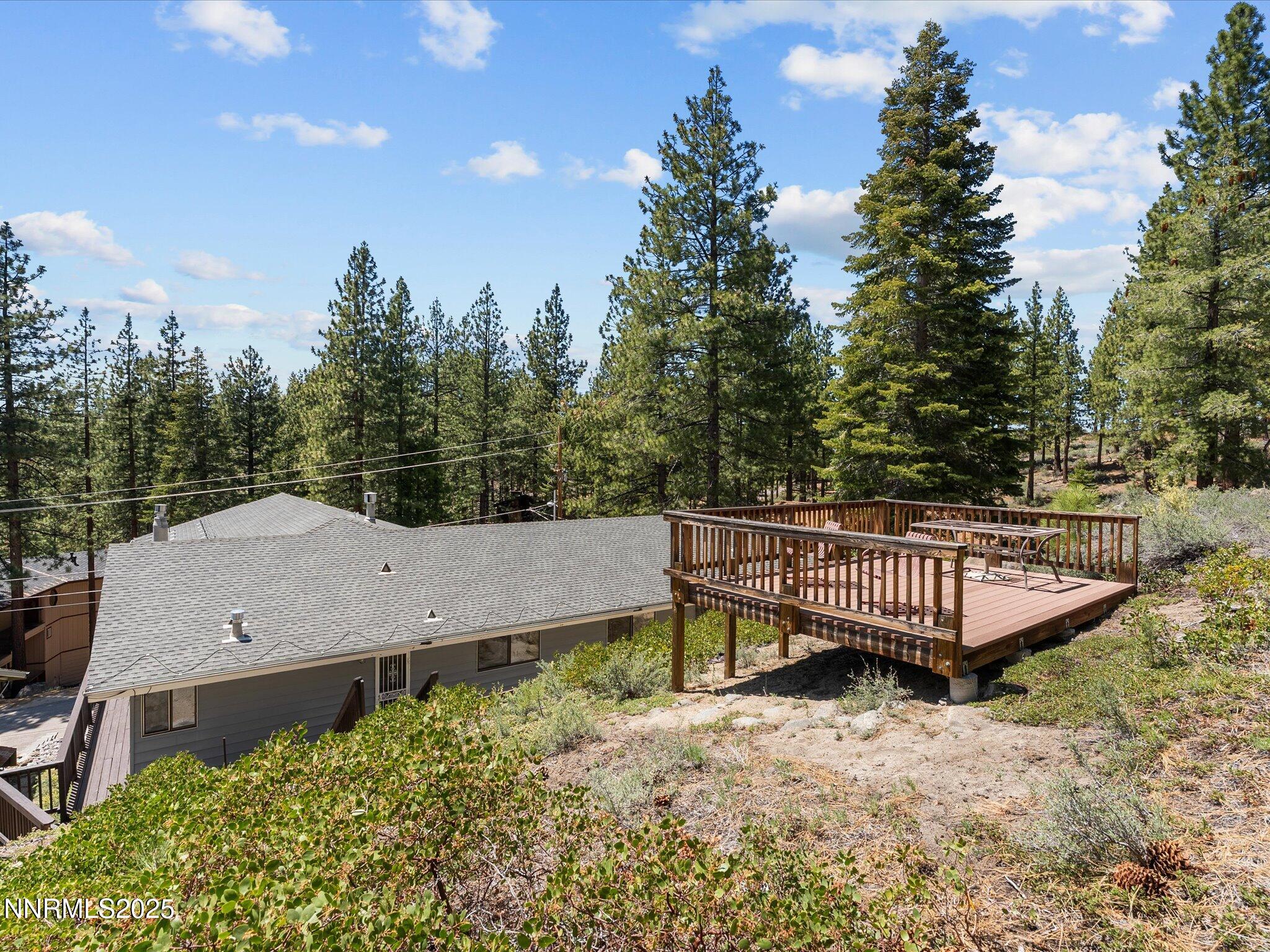 315 Paiute Drive Stateline, NV 89449 - Photo 59 of 77 a view of a tennis ground with large trees