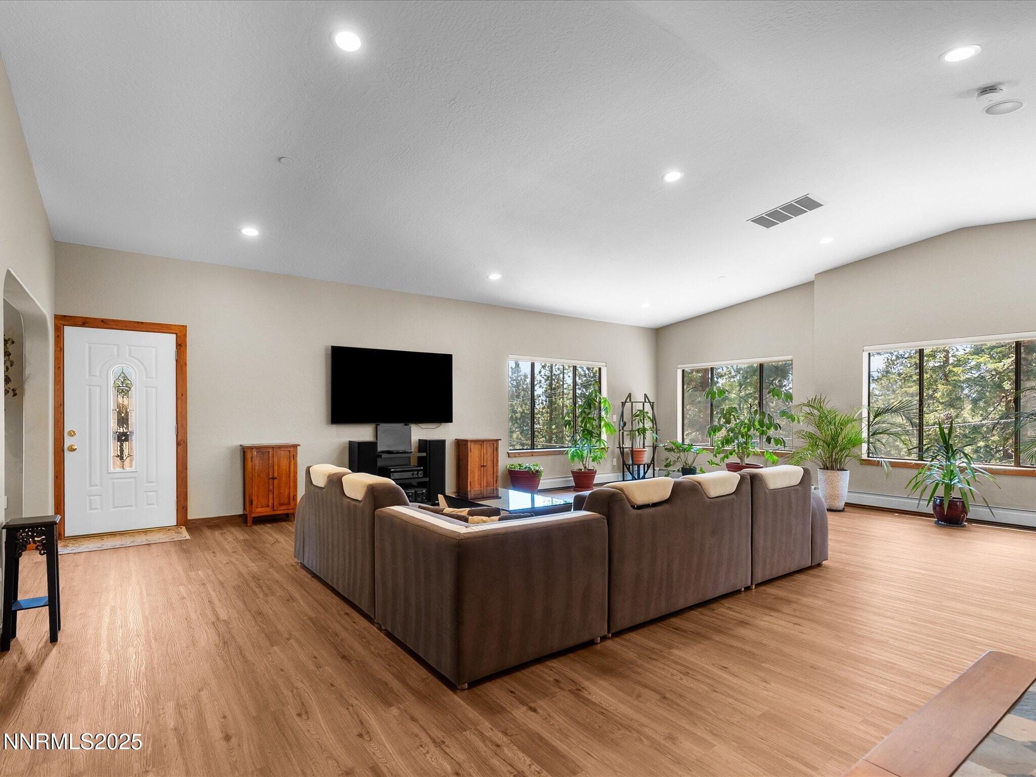 315 Paiute Drive Stateline, NV 89449 - Photo 8 of 77 a living room with furniture wooden floor and a flat screen tv