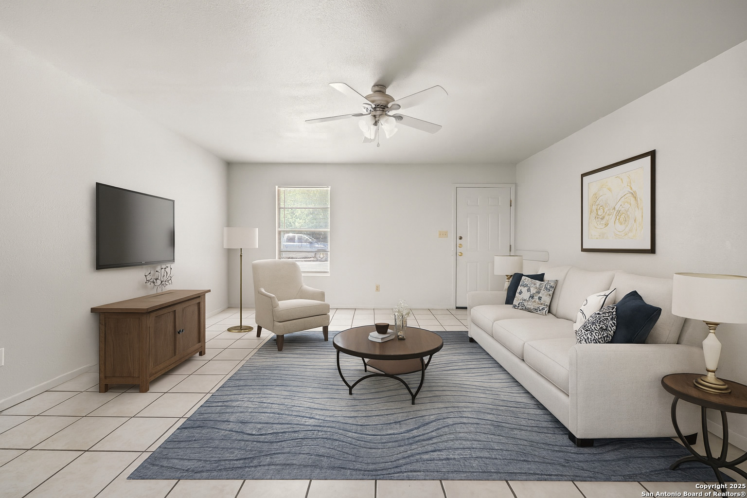 1118 West Goodwin Street, Unit C Pleasanton, TX 78064 - Photo 2 of 13 a living room with furniture and a flat screen tv