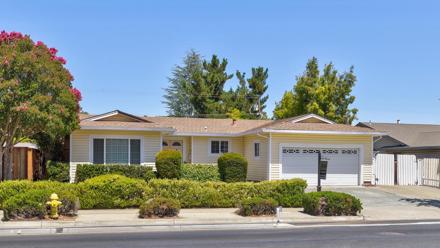 20631 McClellan Road Cupertino, CA 95014 - Photo 1 of 26 front view of a house with a yard