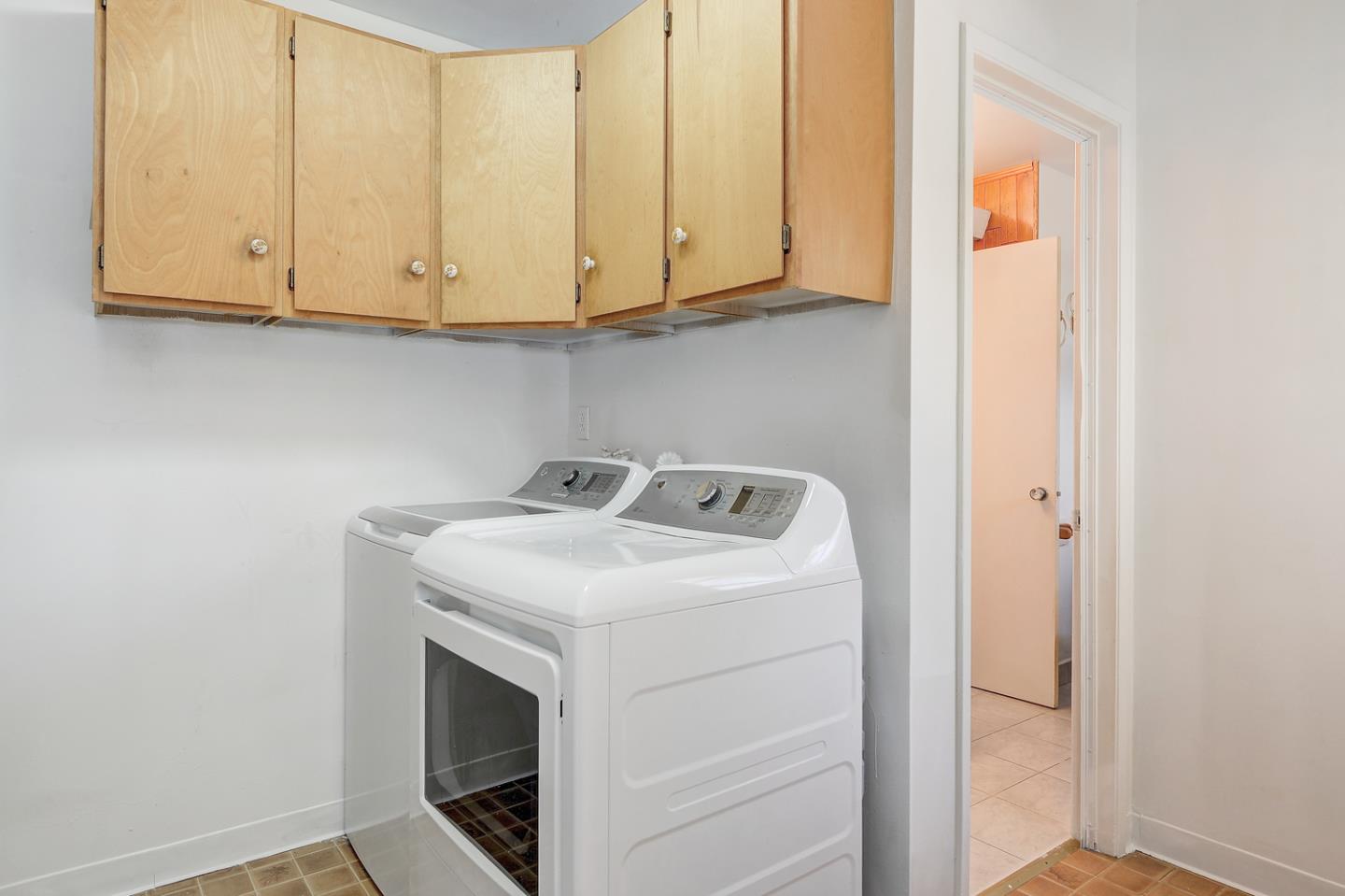 20631 McClellan Road Cupertino, CA 95014 - Photo 11 of 26 a utility room with dryer and washer