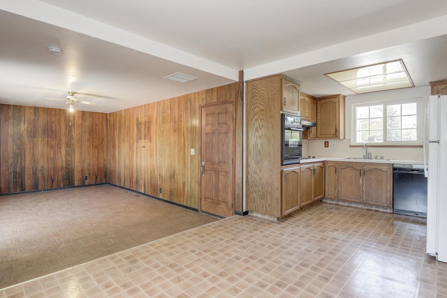 20631 McClellan Road Cupertino, CA 95014 - Photo 19 of 26 a view of a kitchen with a sink and a window