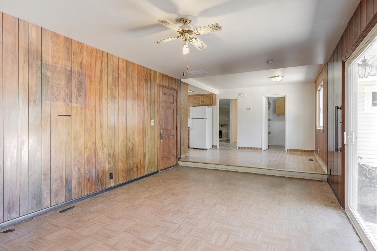20631 McClellan Road Cupertino, CA 95014 - Photo 20 of 26 wooden floor in an empty room with a window