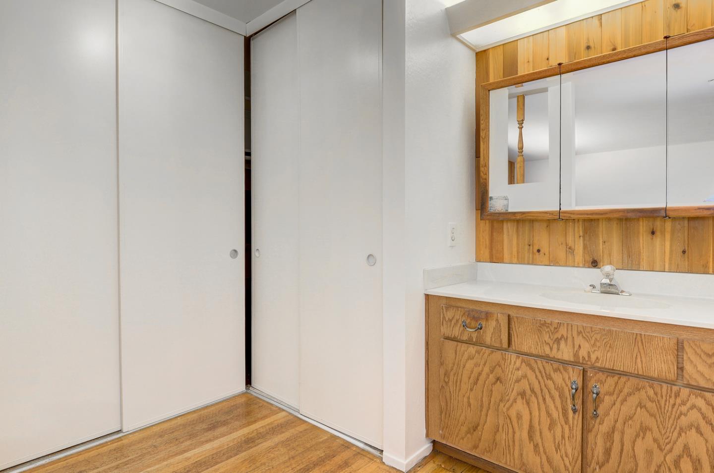 20631 McClellan Road Cupertino, CA 95014 - Photo 22 of 26 a bathroom with a sink and a mirror
