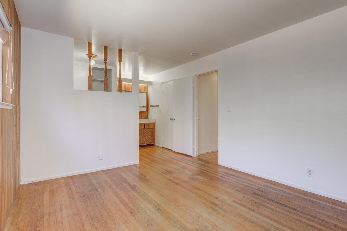 20631 McClellan Road Cupertino, CA 95014 - Photo 4 of 26 a view of a kitchen with wooden floor