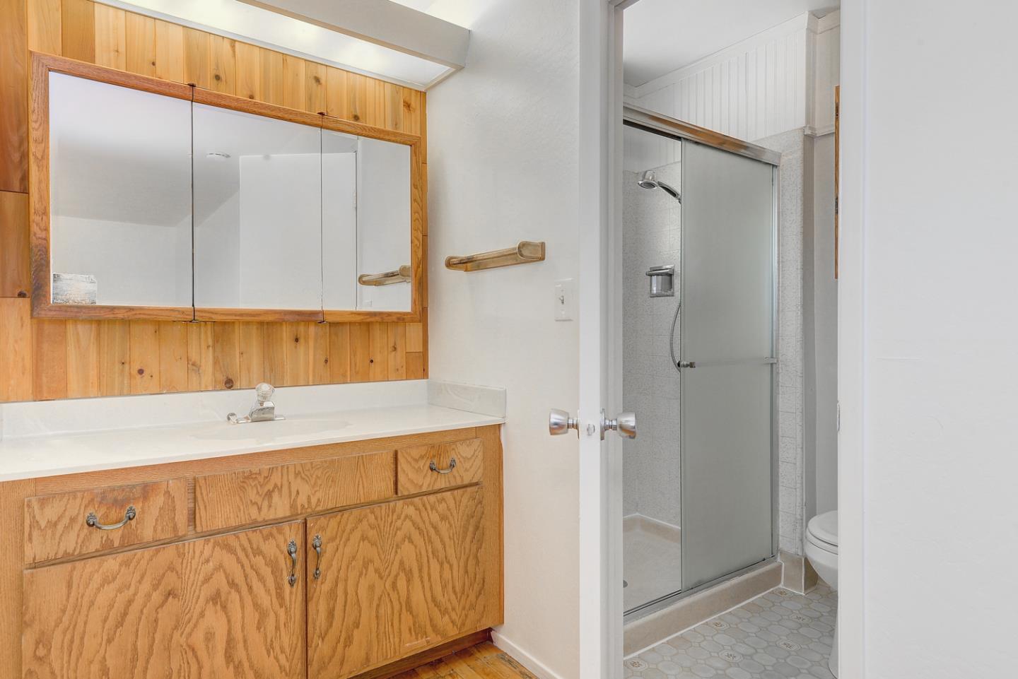 20631 McClellan Road Cupertino, CA 95014 - Photo 7 of 26 a bathroom with a sink and a mirror