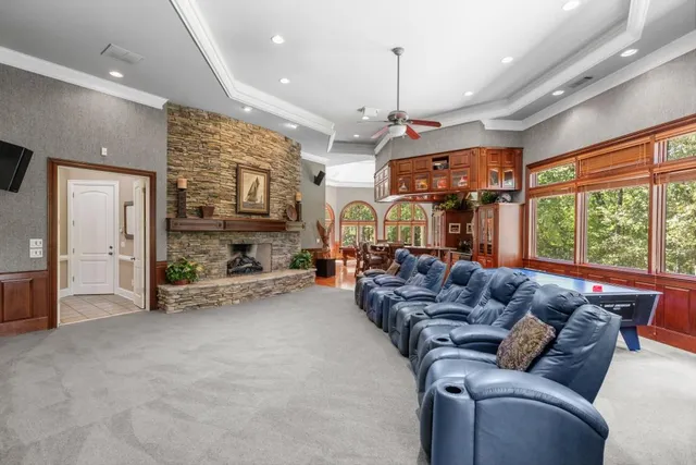 a bedroom with a large bed and a large window