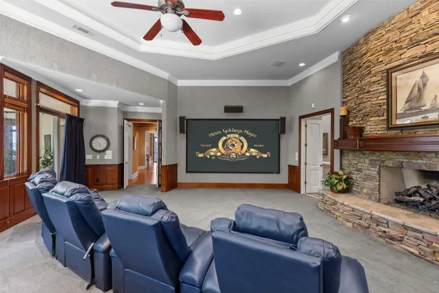 a bathroom with a double vanity sink mirror and toilet