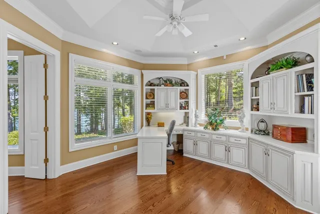 an aerial view of a houses with ocean view