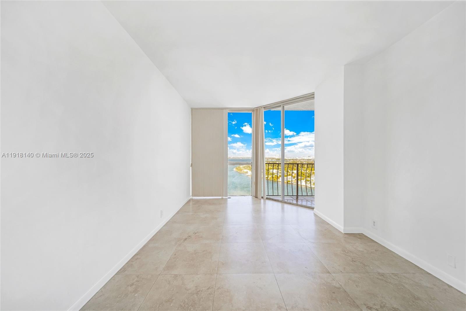 7601 East Treasure Drive, Unit PH215 North Bay Village, FL 33141 - Photo 19 of 40 a view of an empty room with a window