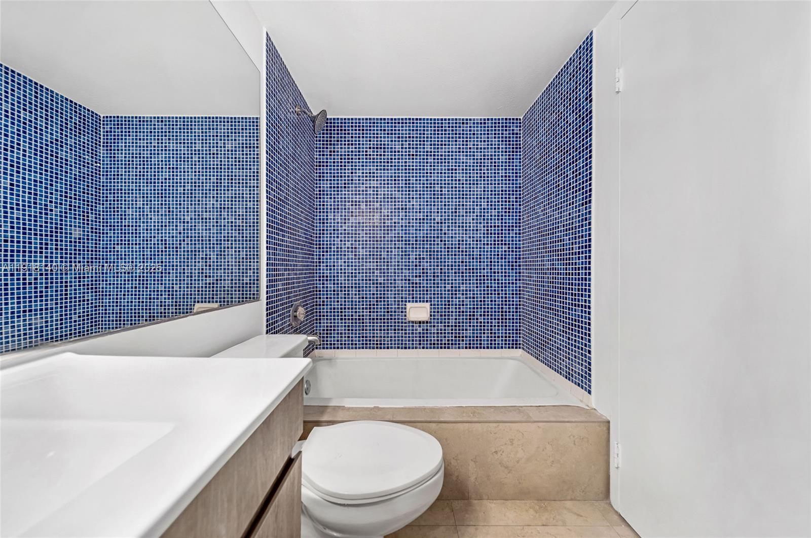 7601 East Treasure Drive, Unit PH215 North Bay Village, FL 33141 - Photo 28 of 40 a bathroom with a toilet and a bathtub