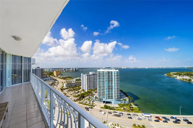 a view of balcony with furniture