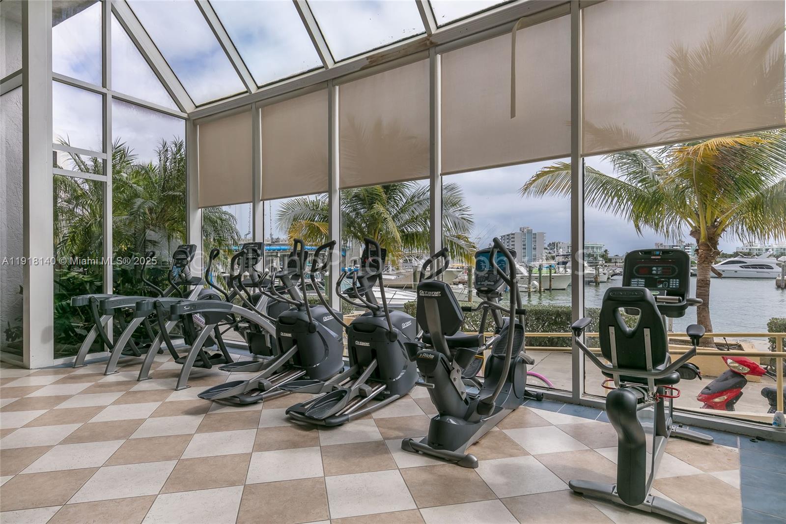 7601 East Treasure Drive, Unit PH215 North Bay Village, FL 33141 - Photo 31 of 40 a view of a room with gym equipment