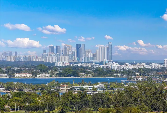 a view of a city with tall buildings