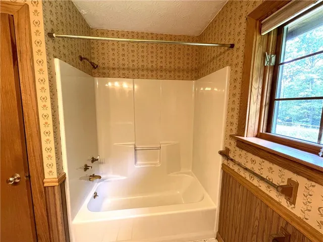 a view of a window and an empty room