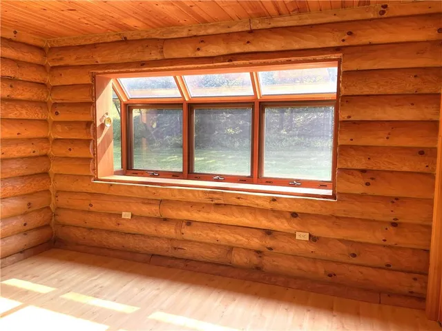 a view of a door and a window