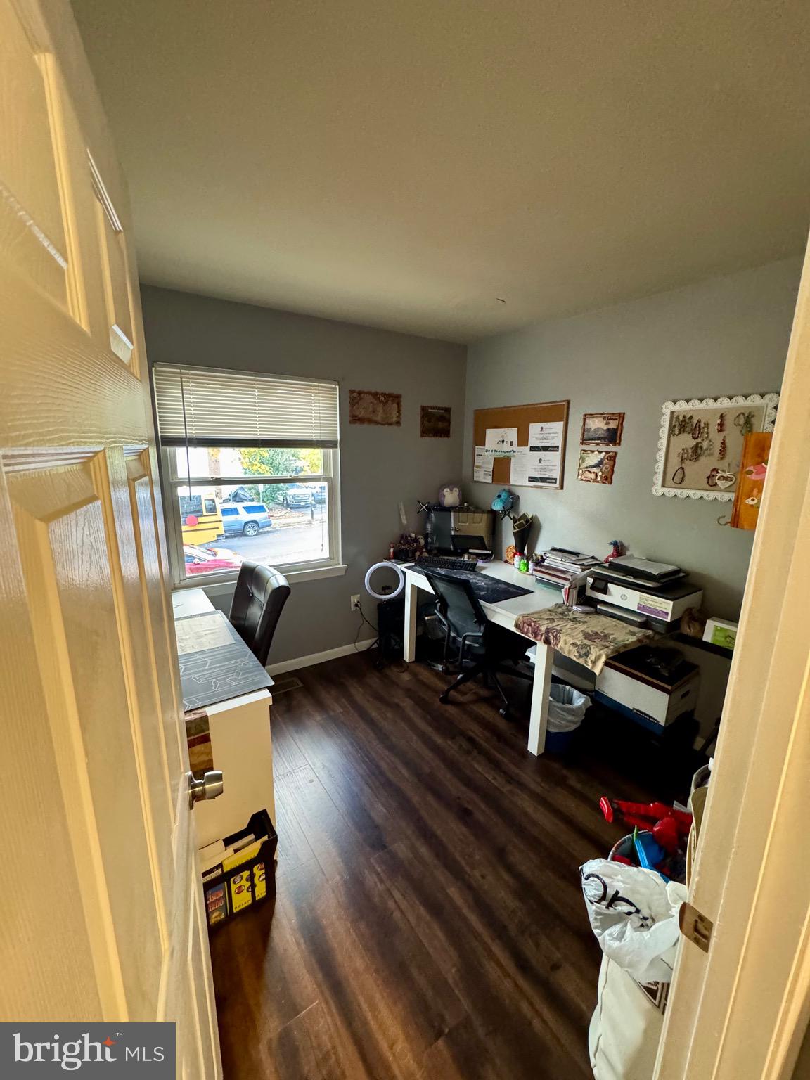 9215 Landgreen Street Manassas, VA 20110 - Photo 16 of 18 a living room with furniture and a table