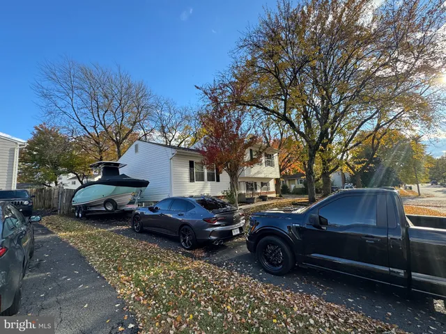 a car parked in front of a house