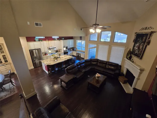a bed room with a bed window and dresser