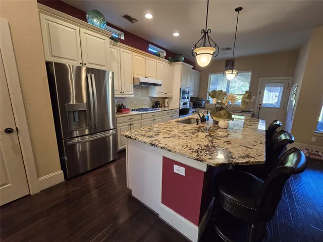 a front view of a house with yard