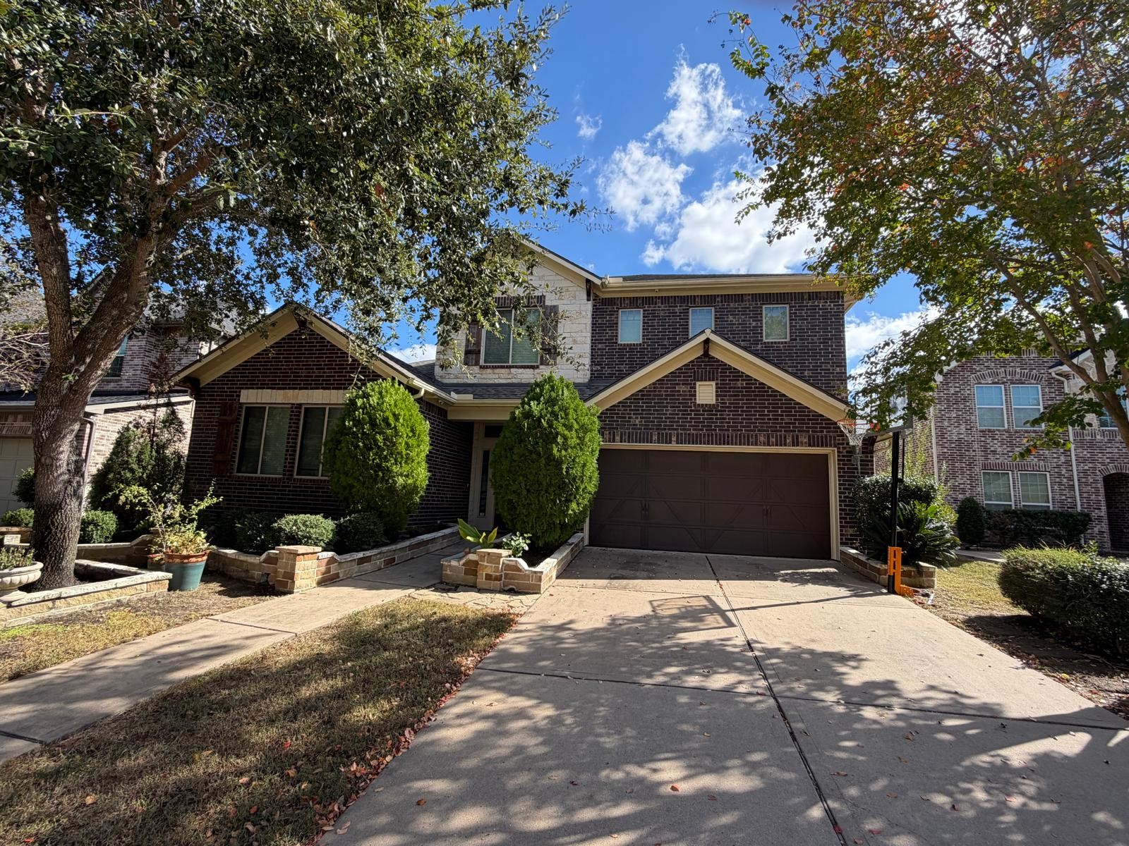 4815 Ashley Hope Drive Katy, TX 77494 - Photo 26 of 26 a front view of a house with a yard and garage