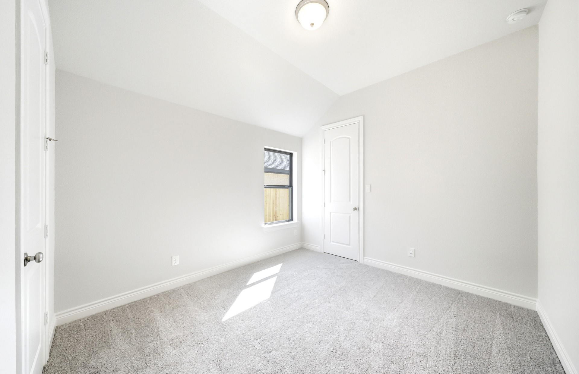 38642 Night Brood Court Magnolia, TX 77354 - Photo 22 of 32 a view of an empty room and window