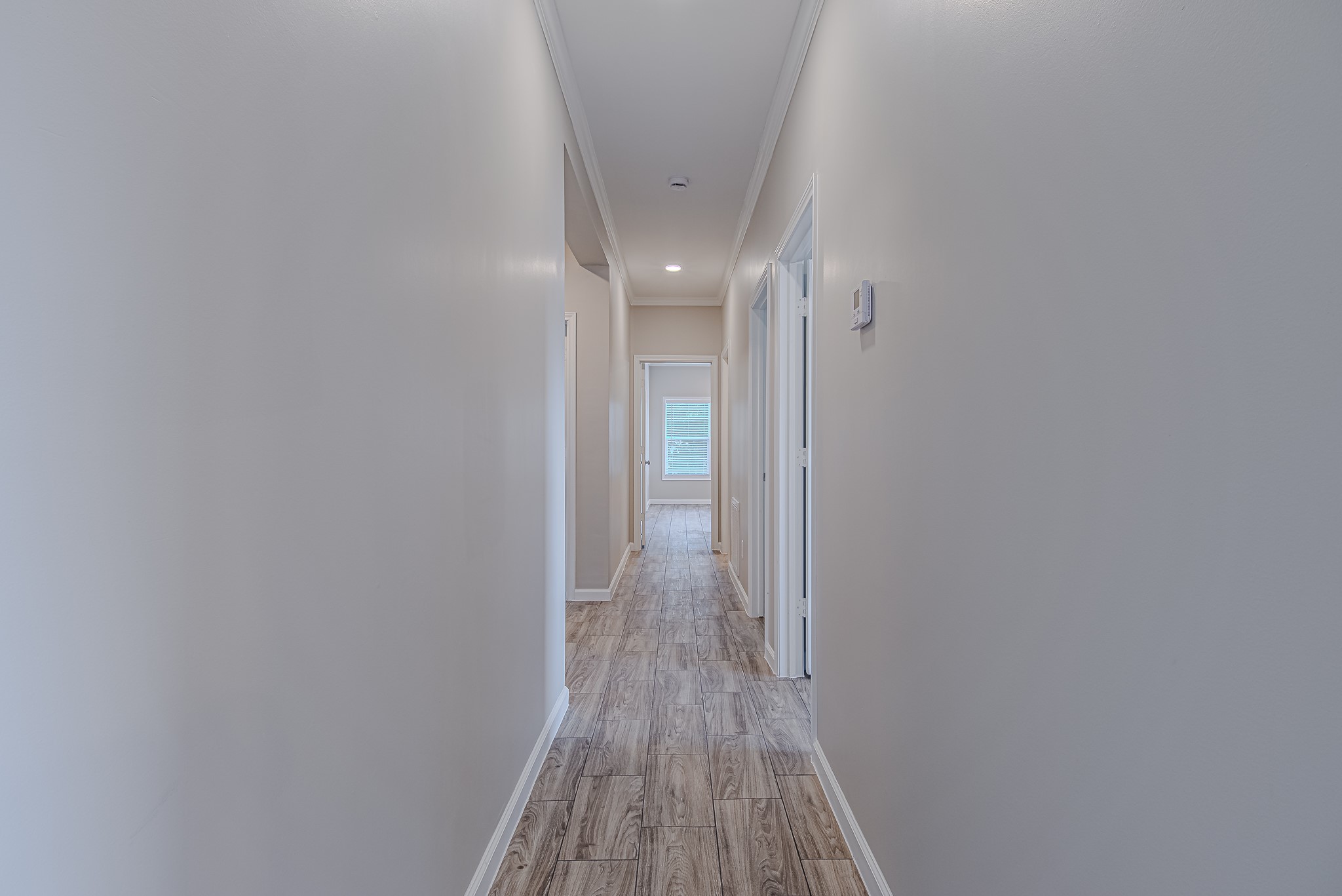 778 Pickering Street Houston, TX 77091 - Photo 12 of 26 Hallway view leading into the private bedroom and bathroom areas