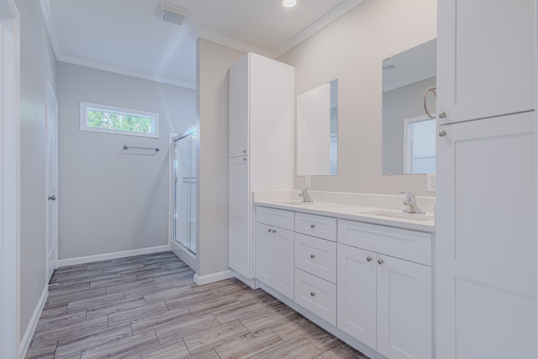 778 Pickering Street Houston, TX 77091 - Photo 15 of 26 Primary ensuite bath with dual sinks, expansive counters, and ample cabinetry
