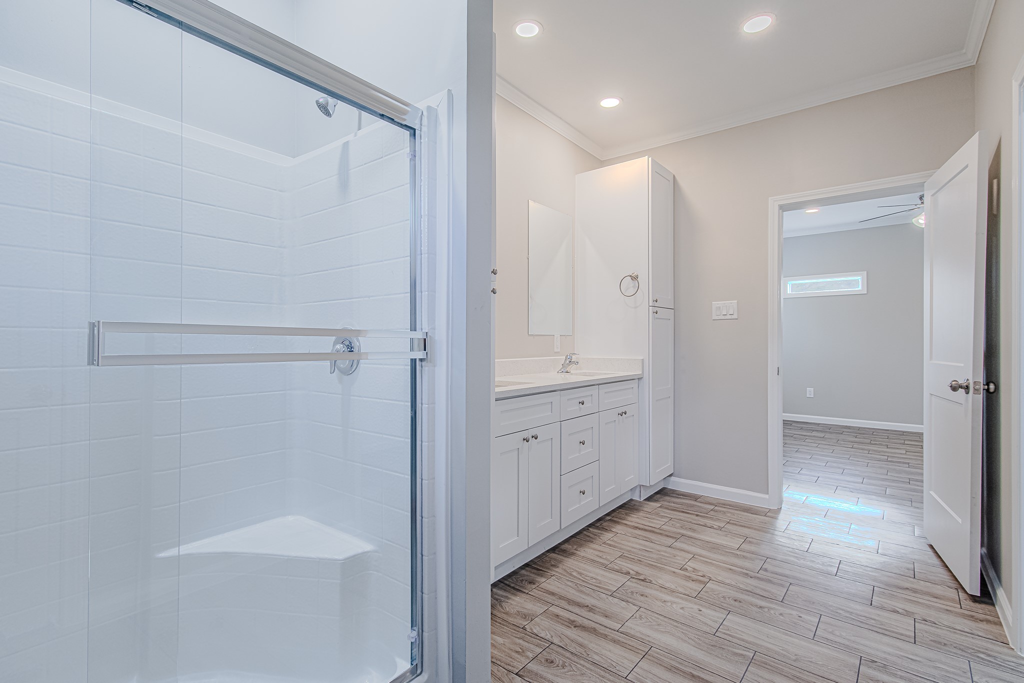778 Pickering Street Houston, TX 77091 - Photo 18 of 26 Additional angle of the primary bathroom highlighting the seamless flow to the walk-in closet