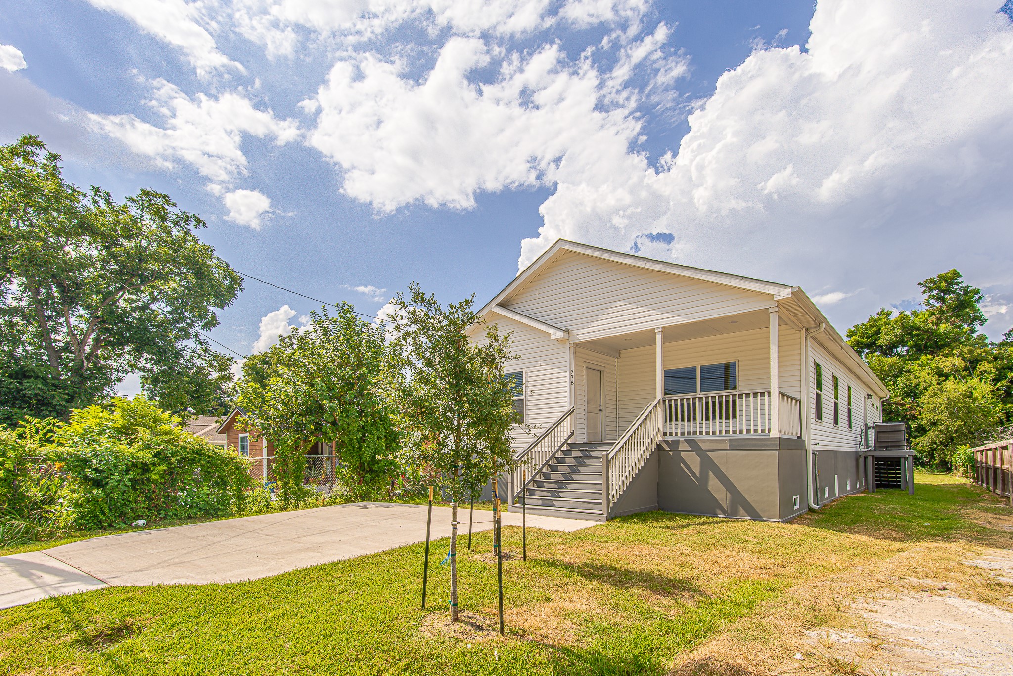 778 Pickering Street Houston, TX 77091 - Photo 2 of 26 Front elevation with stairs leading up to the porch, offering great curb appeal