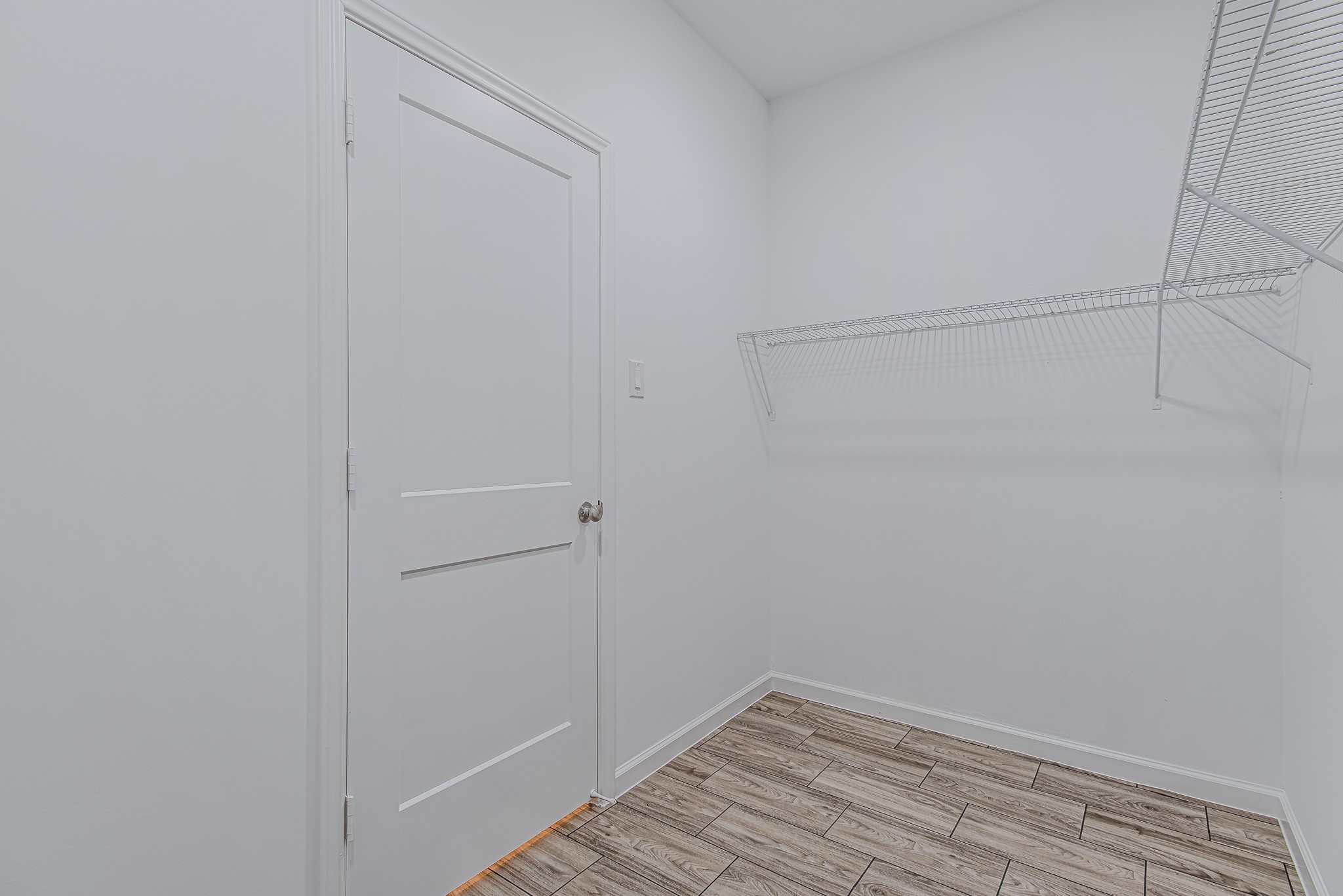 778 Pickering Street Houston, TX 77091 - Photo 20 of 26 Another angle of the primary closet with extra storage capacity