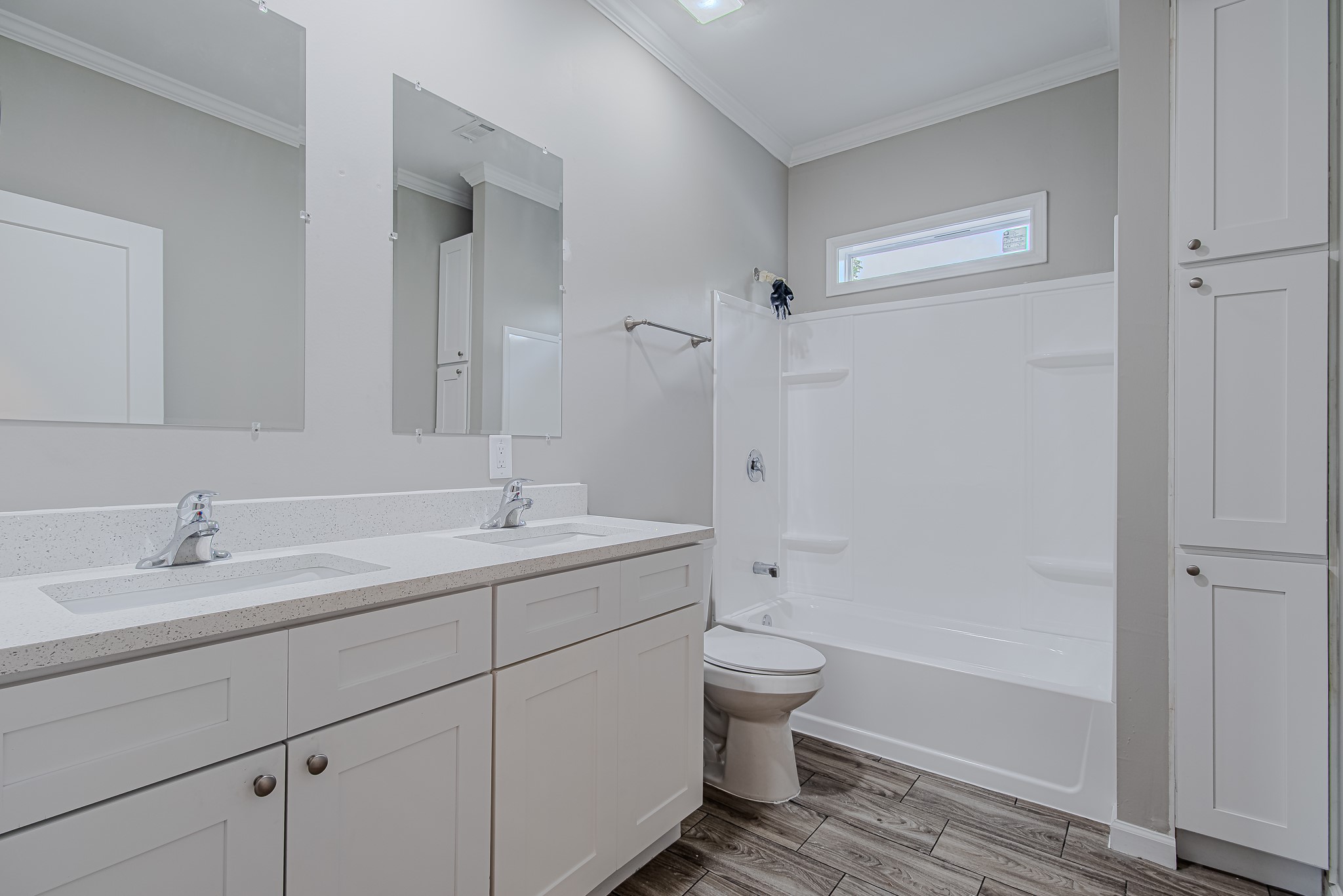 778 Pickering Street Houston, TX 77091 - Photo 22 of 26 Secondary full bathroom with modern finishes, tub/shower combo, and vanity storage