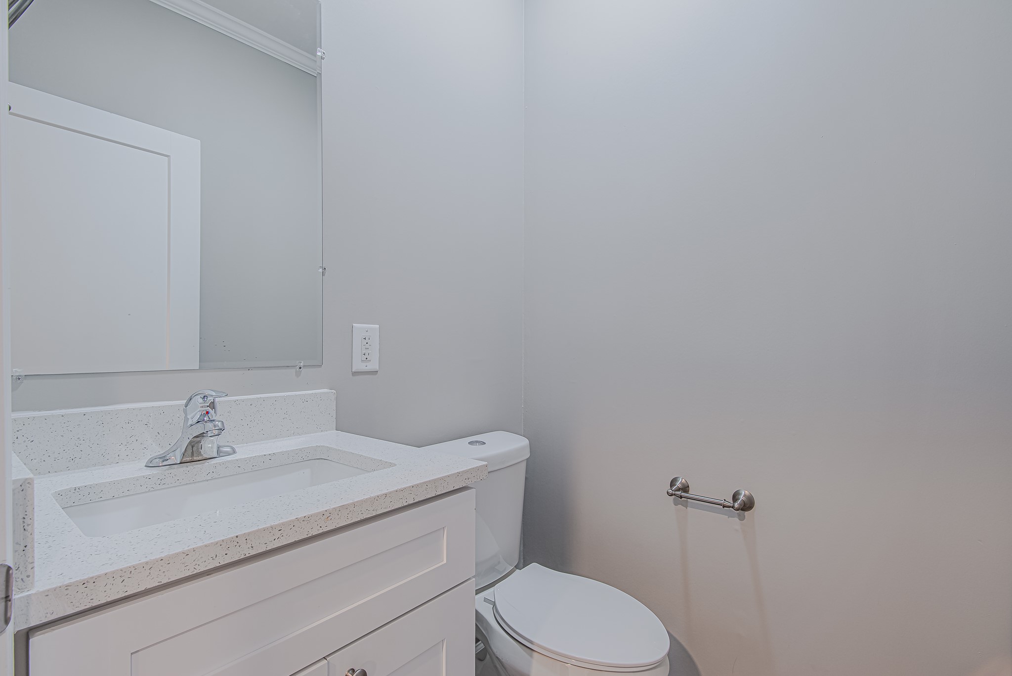 778 Pickering Street Houston, TX 77091 - Photo 24 of 26 Guest bathroom vanity with sink, mirror, and convenient layout
