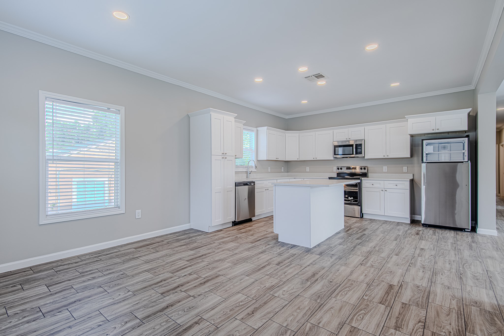 778 Pickering Street Houston, TX 77091 - Photo 4 of 26 Open-concept kitchen and dining area with a spacious layout perfect for gatherings