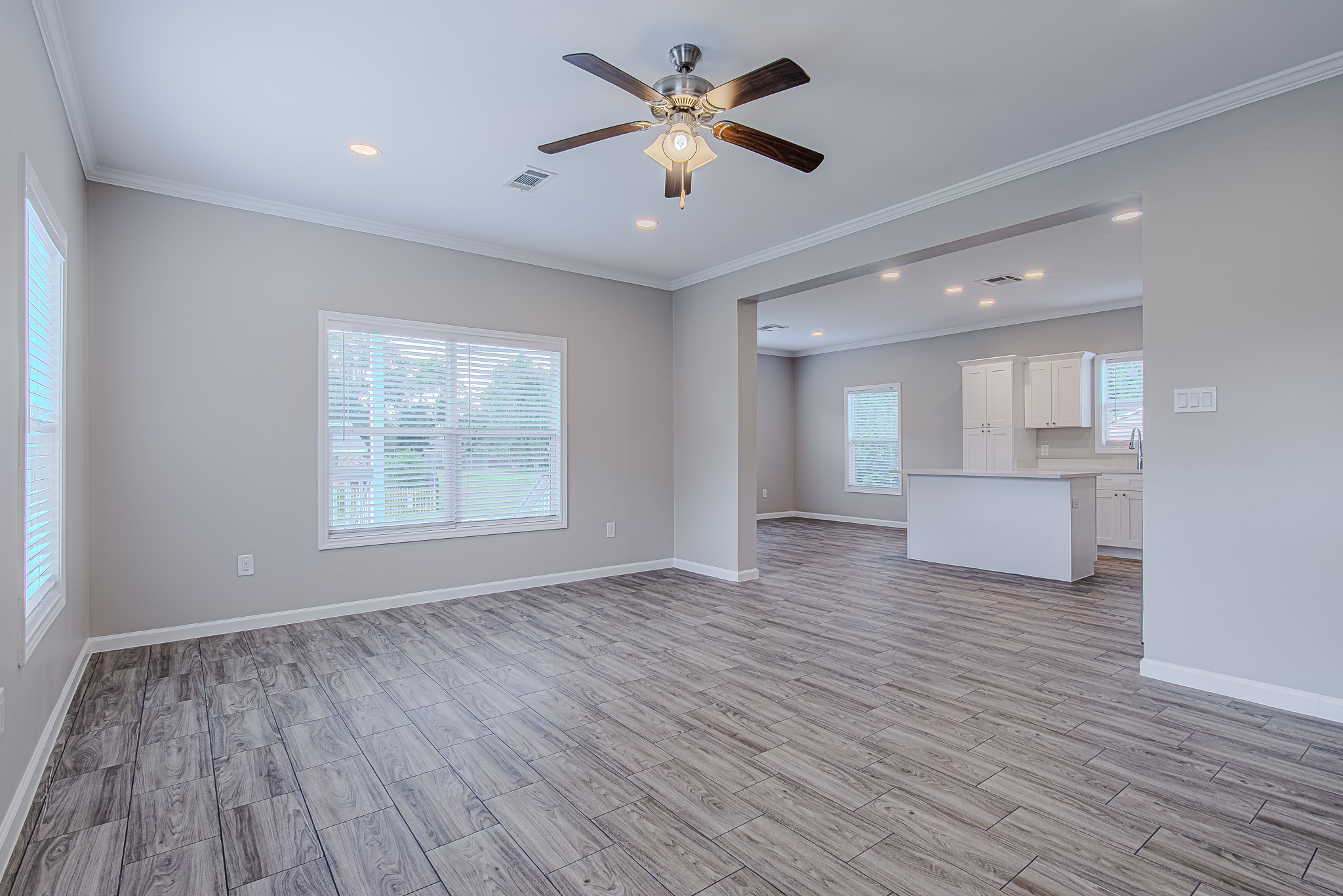 778 Pickering Street Houston, TX 77091 - Photo 9 of 26 Another angle of the living area showcasing its open layout and easy connection to the kitchen