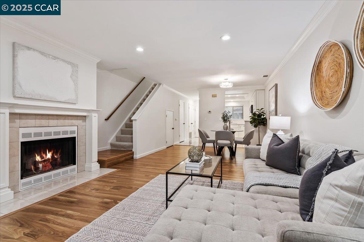 2606 Jones Road, Unit B Walnut Creek, CA 94597 - Photo 11 of 29 a living room with furniture a fireplace and a window