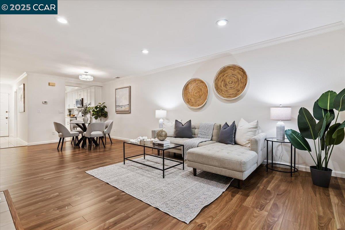 2606 Jones Road, Unit B Walnut Creek, CA 94597 - Photo 2 of 29 a living room with furniture and a wooden floor