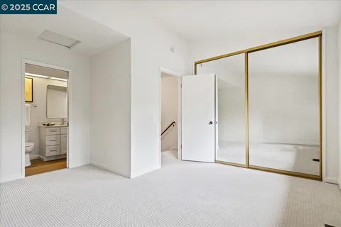 a view of an empty room with a glass door