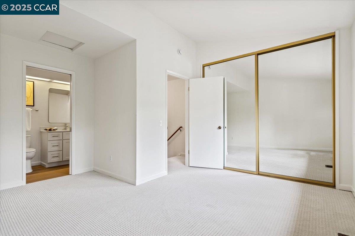 2606 Jones Road, Unit B Walnut Creek, CA 94597 - Photo 21 of 29 a view of an empty room with a glass door