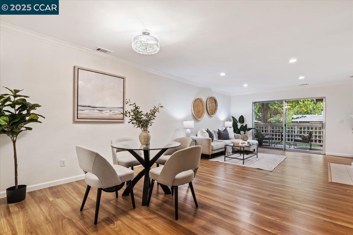 2606 Jones Road, Unit B Walnut Creek, CA 94597 - Photo 8 of 29 a living room with furniture and wooden floor
