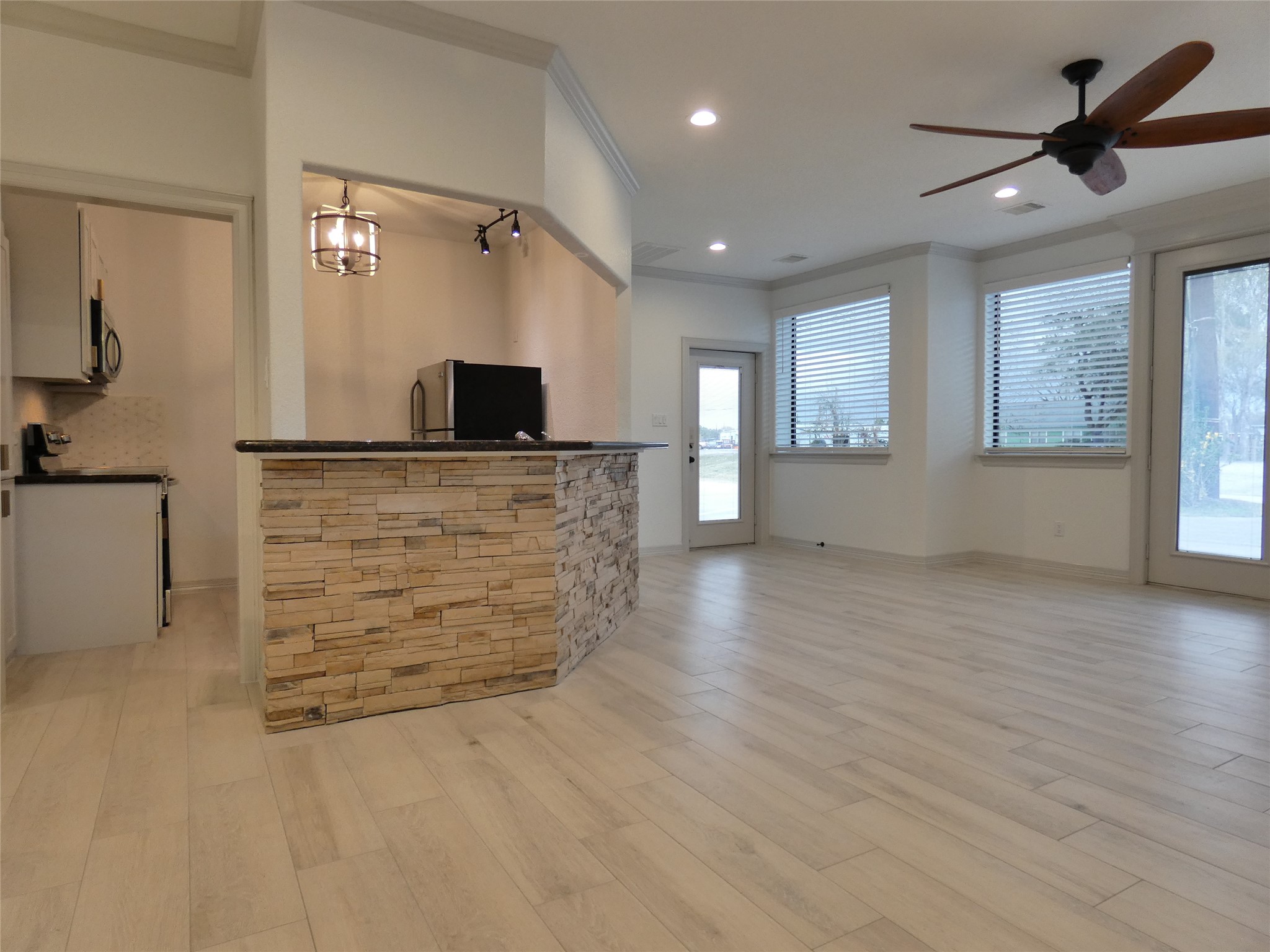 4832 FM 2218 Road, Unit B Rosenberg, TX 77469 - Photo 9 of 33 a view of an empty room and window