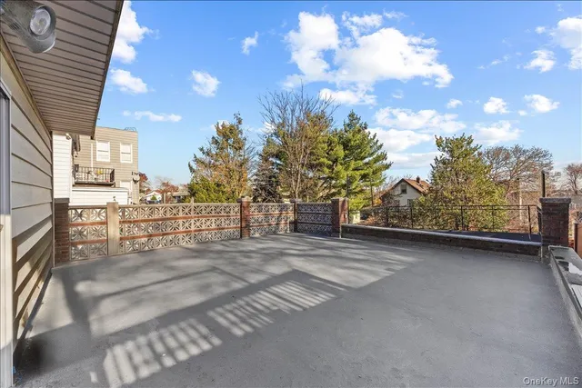 a view of a backyard of the house