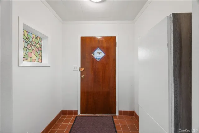 a view of bedroom with front door