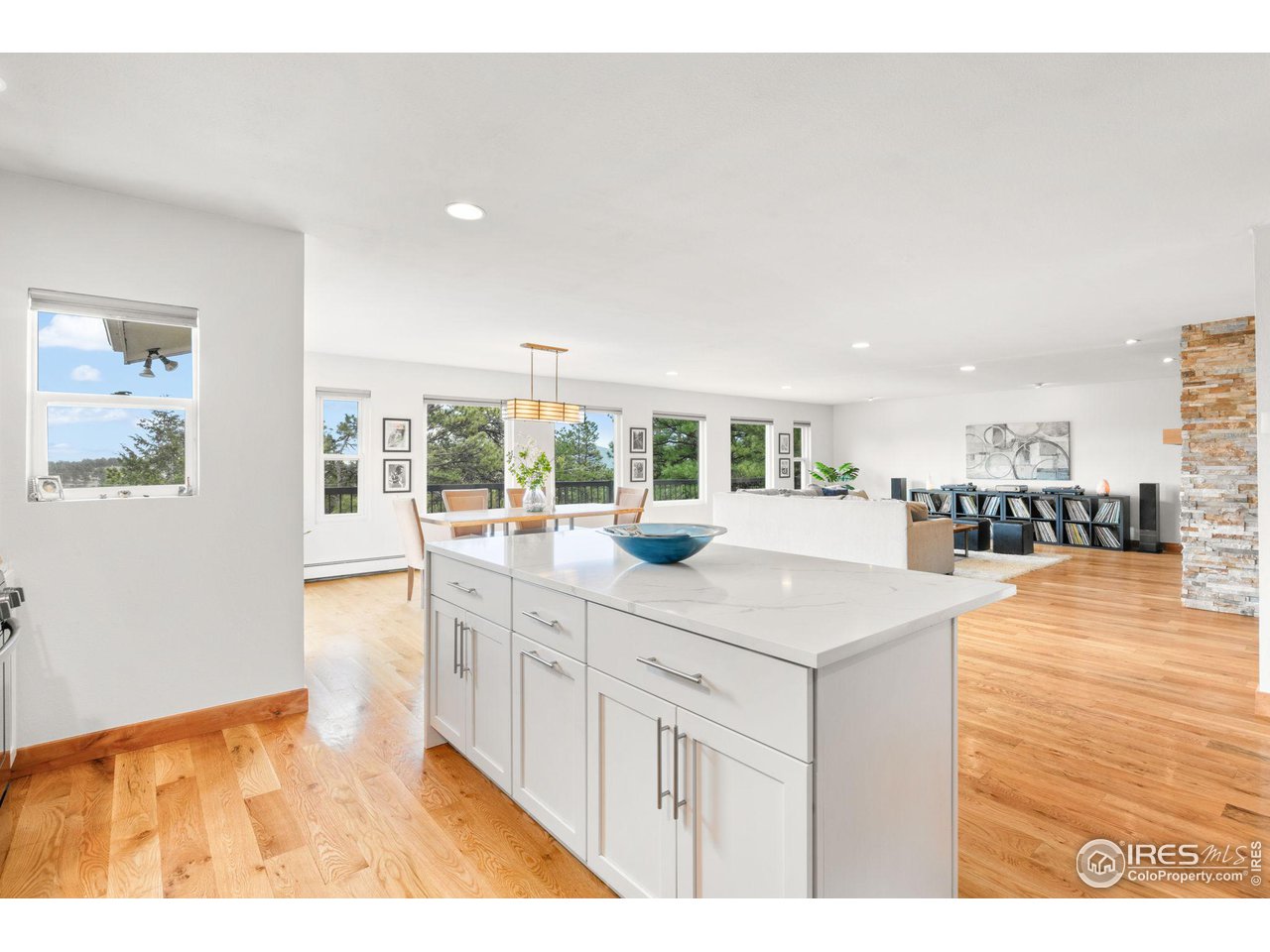 801 Kelly Road West Boulder, CO 80302 - Photo 16 of 33 a kitchen with stainless steel appliances granite countertop a sink and a wooden floors